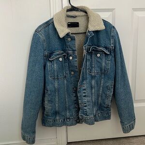 ASOS Design denim jacket with Teddy lining in light wash blue